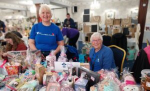 Margaret smith with Michelle grainger and a tombola