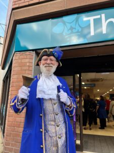 The new The Prince of Wales Hospice superstore and town crier