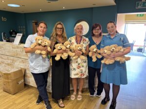 Incare staff with donation of bears
