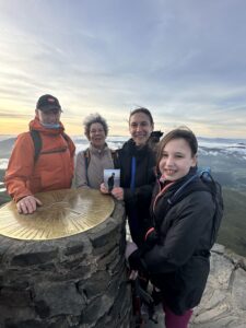 Olivia and her family at the top