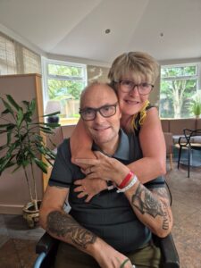 James and maria embrace as they celebrate their 35th anniversary