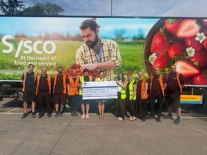 Sysco staff with cheque presentation