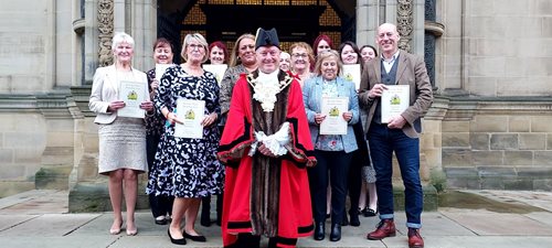 Our retail team receive the Mayor's thank you